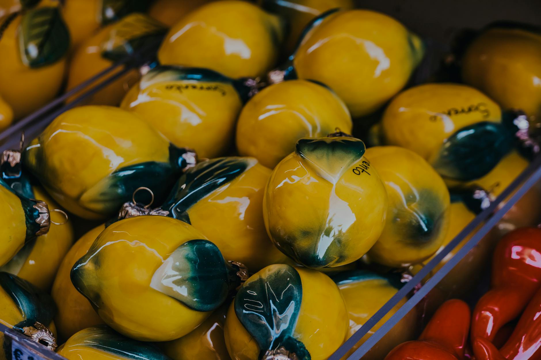 A bright yellow silicone vibrator surrounded by fresh bananas on a sunny yellow surface, symbolizing renewed sensation and pleasure.